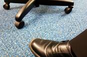 woman walks into office in brogues